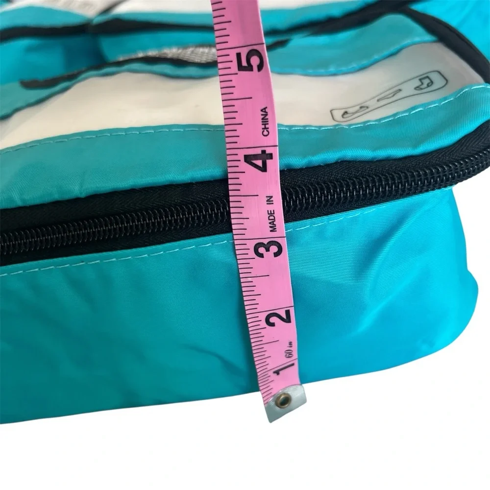 NWOT Teal and Clear Packing Cubes - Set of 4